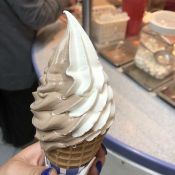 Carvel - a hand holding an ice cream cone - Ice Cream & Frozen Yogurt Near Me - New Rochelle, New York Carvel - a hand holding an ice cream cone - Ice Cream & Frozen Yogurt Near Me - New Rochelle, New York