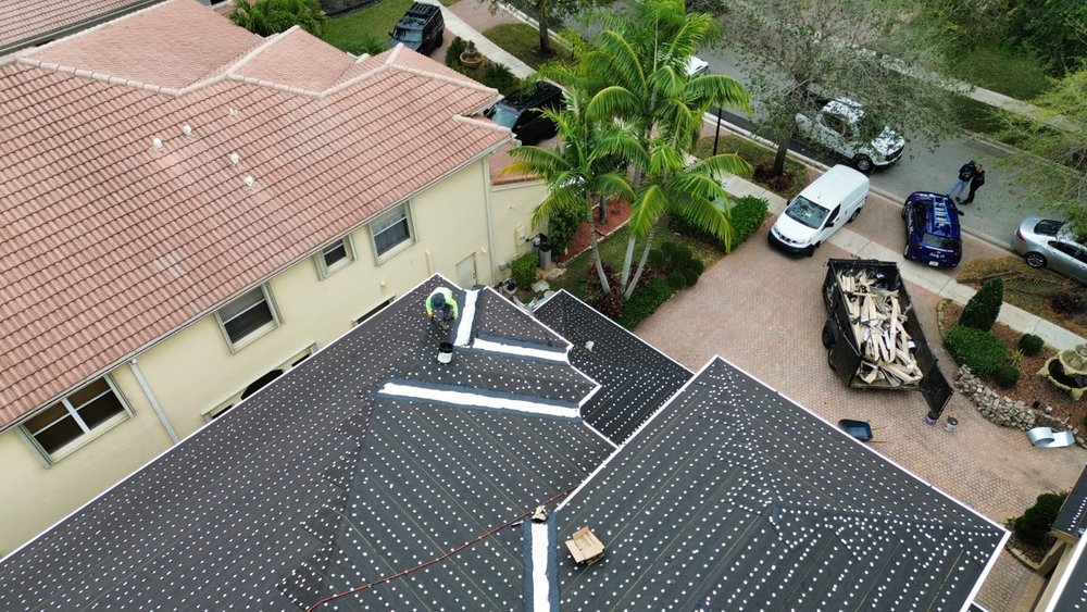 Slide of Friendly Roofing