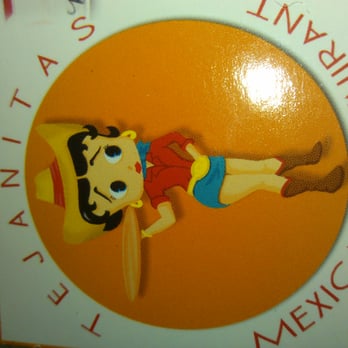 Tejanitas Mexican Restaurant - a woman in a mexican dress - Mexican Near Me - San Antonio, Texas Tejanitas Mexican Restaurant - a woman in a mexican dress - Mexican Near Me - San Antonio, Texas
