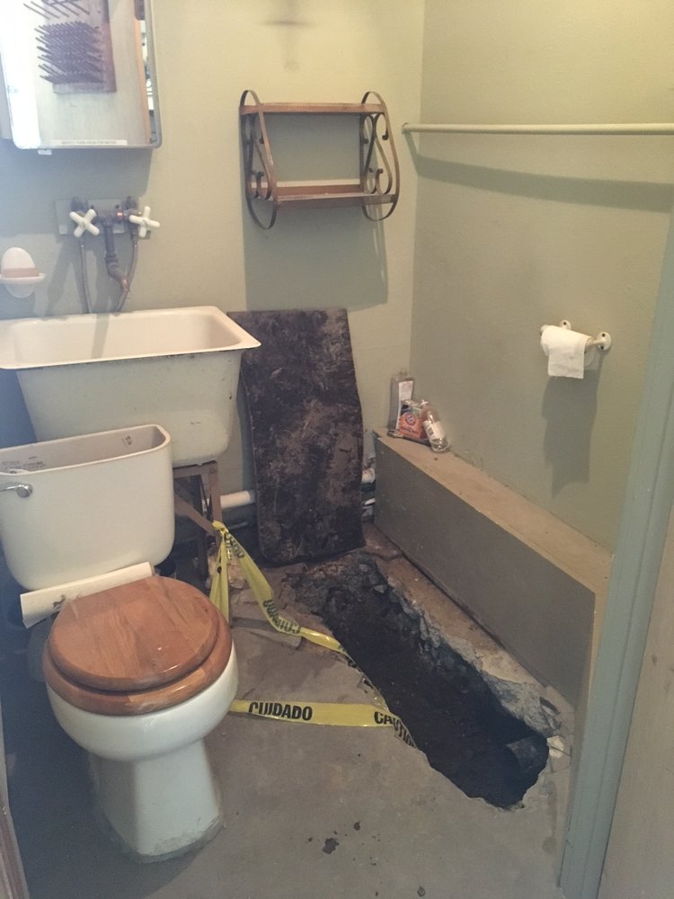 Slide of AA Plumbing & Drain Team