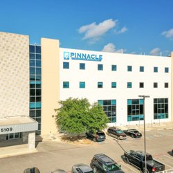 Pinnacle Clinical Research - View of parking and building exterior for Pinnacle Clinical Research