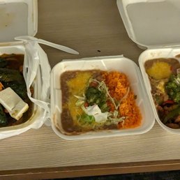 On the left two containers, Brody 's Molcajete Supreme. On the right, the beef fajitas. Came with a total of 9 tortillas. Was a lot of food. On the left two containers, Brody 's Molcajete Supreme. On the right, the beef fajitas. Came with a total of 9 tortillas. Was a lot of food.