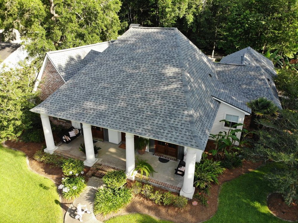 Slide of Mid City Roofing