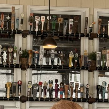 Craft 31 - Outside bar area picture is of taps as a decoration - Pizza Near Me - Williamsburg, Virginia Craft 31 - Outside bar area picture is of taps as a decoration - Pizza Near Me - Williamsburg, Virginia