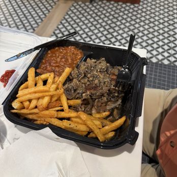 Southern Spin Kitchen - Pork chops, smothered, and mushrooms with beans and fries - American Near Me - Dumfries, Virginia
