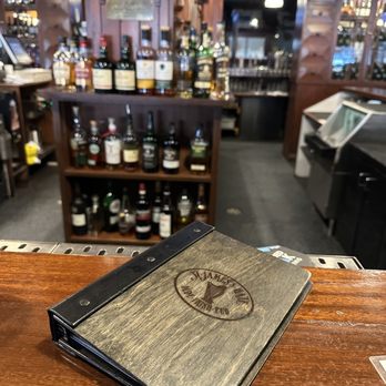 St James's Gate - a menu book on a bar - Irish Pub Near Me - Banff, Alberta St James's Gate - a menu book on a bar - Irish Pub Near Me - Banff, Alberta