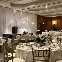 The Wedding Linen - Halekulani's high ceiling ballroom. Pipe & draping w/curtain accents.