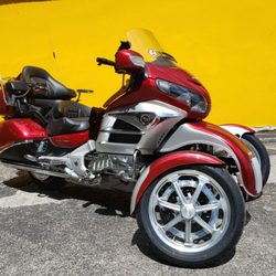 On Wings of Gold - We do install for Tilting Motor Works TRiO Tiltlock on Goldwing's, Harley's and Indians