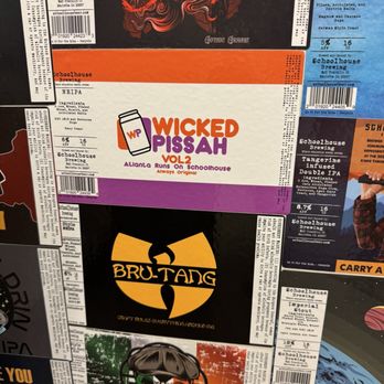Schoolhouse Brewing - Sticker wall in the women's restroom - Breweries Near Me - Marietta, Georgia