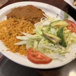 Cancun - Pollo Hawaiiano came with rice, beans, and greens all of which was tasty & fresh.