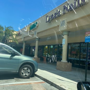 Subway - a car parked in front of a store - Sandwiches Near Me - Boynton Beach, Florida