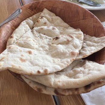 Chillies Tandoori - Naan Bread. Light, fluffy and - Indian Near Me - London, XGL Chillies Tandoori - Naan Bread. Light, fluffy and - Indian Near Me - London, XGL