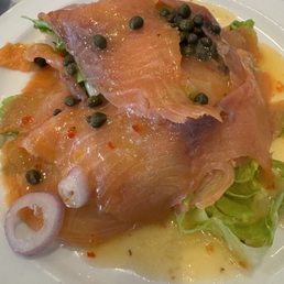 Lox & Bagels (it's one bagel on the side), served with about 6 ounces of THICK Italian dressing Lox & Bagels (it's one bagel on the side), served with about 6 ounces of THICK Italian dressing