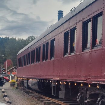 Mount Rainier Railroad Dining - a red train car - American Near Me - Elbe, Washington