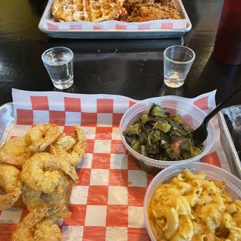The Rolling Rooster - 7 Large Shrimp and 2 Sides Plate Waffle and chicken 4 Tenders and Waffle Plate - Chicken Wings Near Me - Austin, Texas The Rolling Rooster - 7 Large Shrimp and 2 Sides Plate Waffle and chicken 4 Tenders and Waffle Plate - Chicken Wings Near Me - Austin, Texas