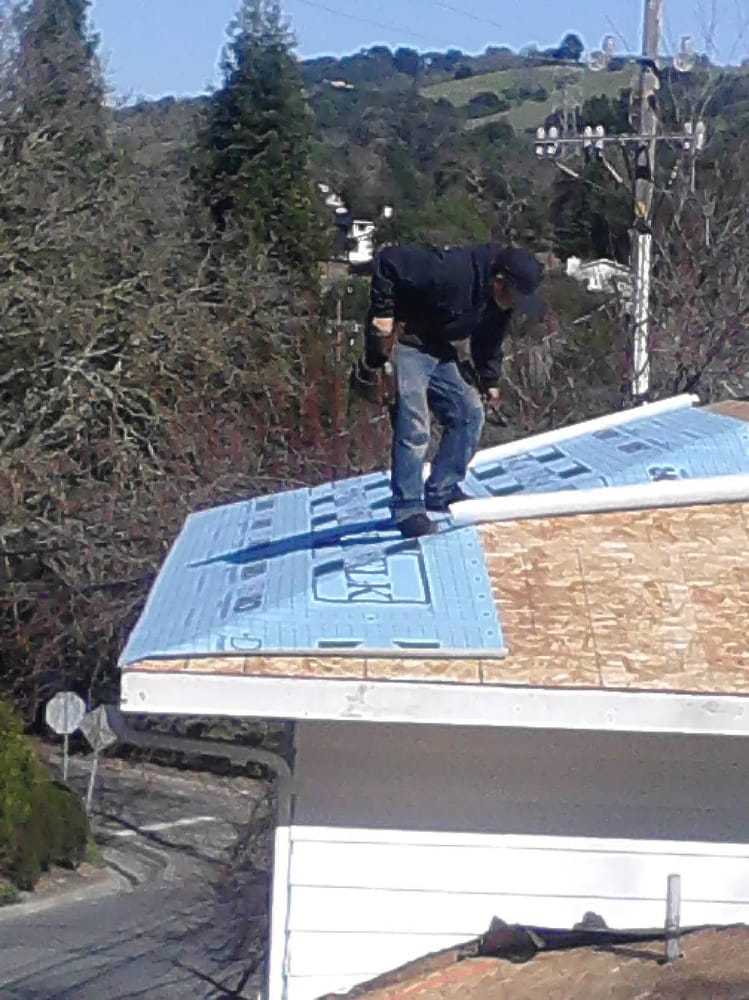 Slide of Elliott & Son Roofing