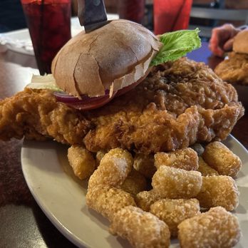 One Eyed Jack's - Breaded pork tenderloin with tots. - American Near Me - Winamac, Indiana