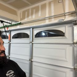 Precision Garage Door - Manny & the new springs...on our garage door.