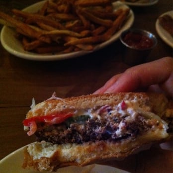 DMK Burger Bar - Grass-fed lamb, sheep's milk feta, olive tapenade, Greek salad and tzatziki sauce. Opa! - Burgers Near Me - Chicago, Illinois