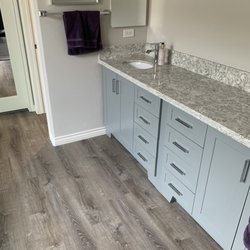 F Spear Handyman Service - Store bought cabinets with paint matched, made to fit filler. I also did the floors, trim and paint seen.