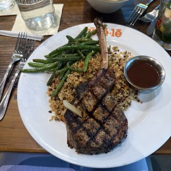 Ulele - Tomahawk pork chop - New American Near Me - Tampa, Florida Ulele - Tomahawk pork chop - New American Near Me - Tampa, Florida