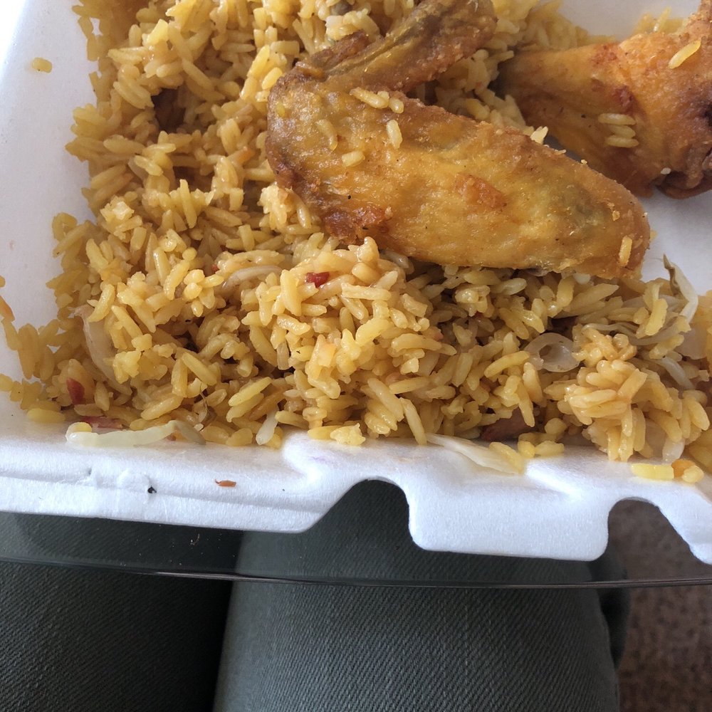 chicken and rice in a styrofoam container
