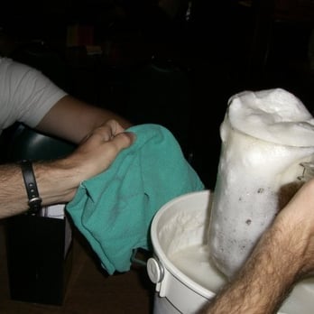 Crunchy's - bucket of foamy beer - Bars Near Me - East Lansing, Michigan
