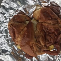 Bacon, egg, cheese on croissant.