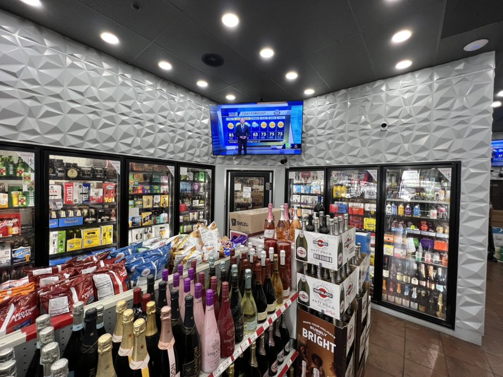 Village Liquor & More Logo
