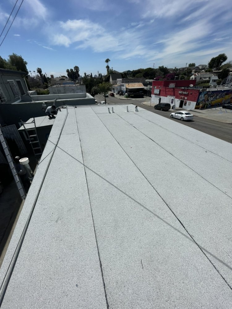 Slide of JR Custom Roofing