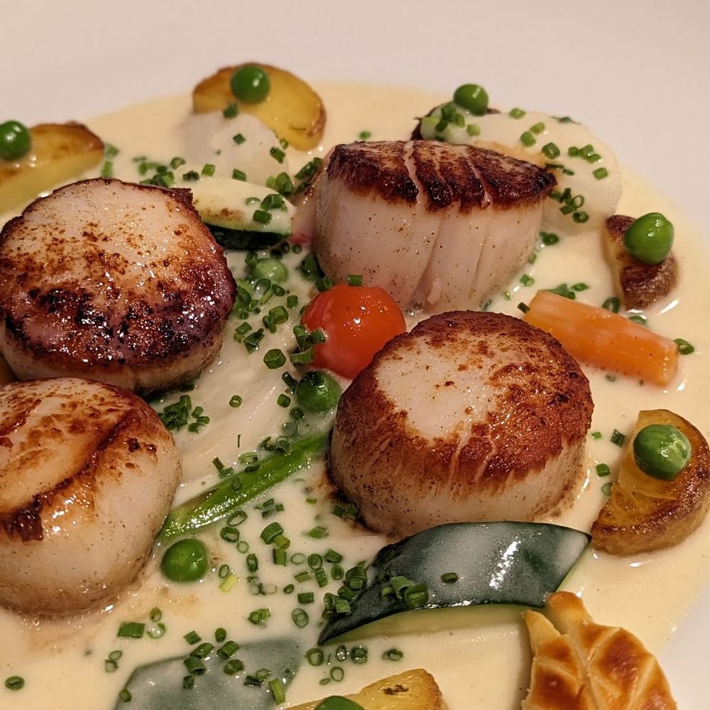 Le Crocodile Restaurant - Scallops pan-seared - French Near Me - Vancouver, British Columbia Le Crocodile Restaurant - Scallops pan-seared - French Near Me - Vancouver, British Columbia