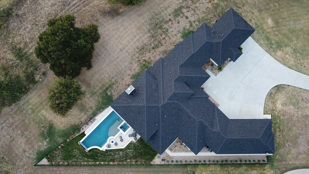 Slide of Compass Roofing