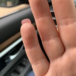 Jane's Nail Art - Gel left on my hand even after she used an exfoliating scrub and I washed them