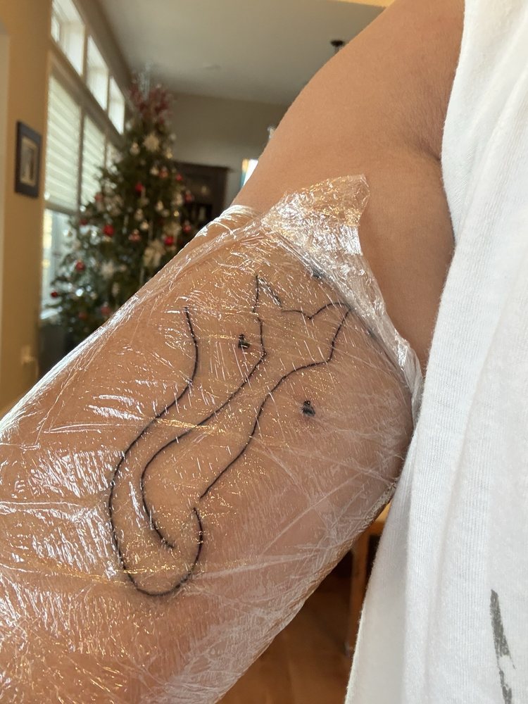 Hung‘s Tattoo Parlor Logo