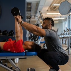 More Than Fit Training - It's all about the details and attention. We are working on her movement and control during the chest press.