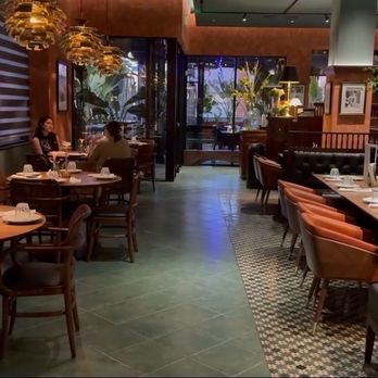 Star Leaf - Part of the restaurant reserved for us for our large party (round tables replaced by a long table for 25 people) - Asian Fusion Near Me - Pasadena, California