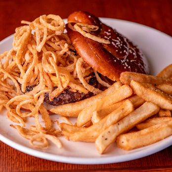 The Pub - Naples - Belhaven beer cheese, Tabasco onion straws, pretzel bun - British Near Me - Naples, Florida