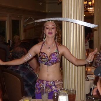 Darya Restaurant - Fabulous Karina balancing knife on her head - Persian/Iranian Near Me - Orange, California Darya Restaurant - Fabulous Karina balancing knife on her head - Persian/Iranian Near Me - Orange, California