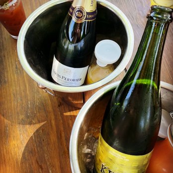 The Little Darlin' - Mimosa bucket - American Near Me - Austin, Texas The Little Darlin' - Mimosa bucket - American Near Me - Austin, Texas