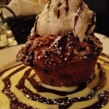 Meritage Restaurant - the scrumptious chocolate pudding. crispy on the outside with ooey gooey center topped with chocolate sauce and ice cream. - New American Near Me - Scarsdale, New York Meritage Restaurant - the scrumptious chocolate pudding. crispy on the outside with ooey gooey center topped with chocolate sauce and ice cream. - New American Near Me - Scarsdale, New York