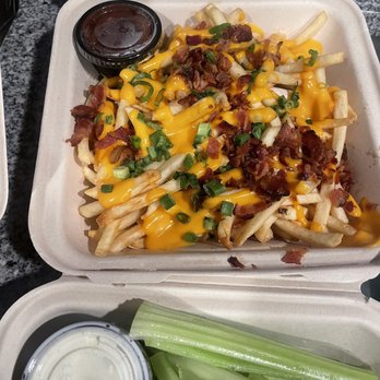 Cluck Chicken - Loaded baked potatoes fries - Comfort Food Near Me - Denver, Colorado