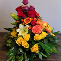 Blooms of Paradise - This juried artwork depicts the Suffrage movement in Tennessee. The yellow roses are yes votes, while stodgy holdouts are dried red roses.