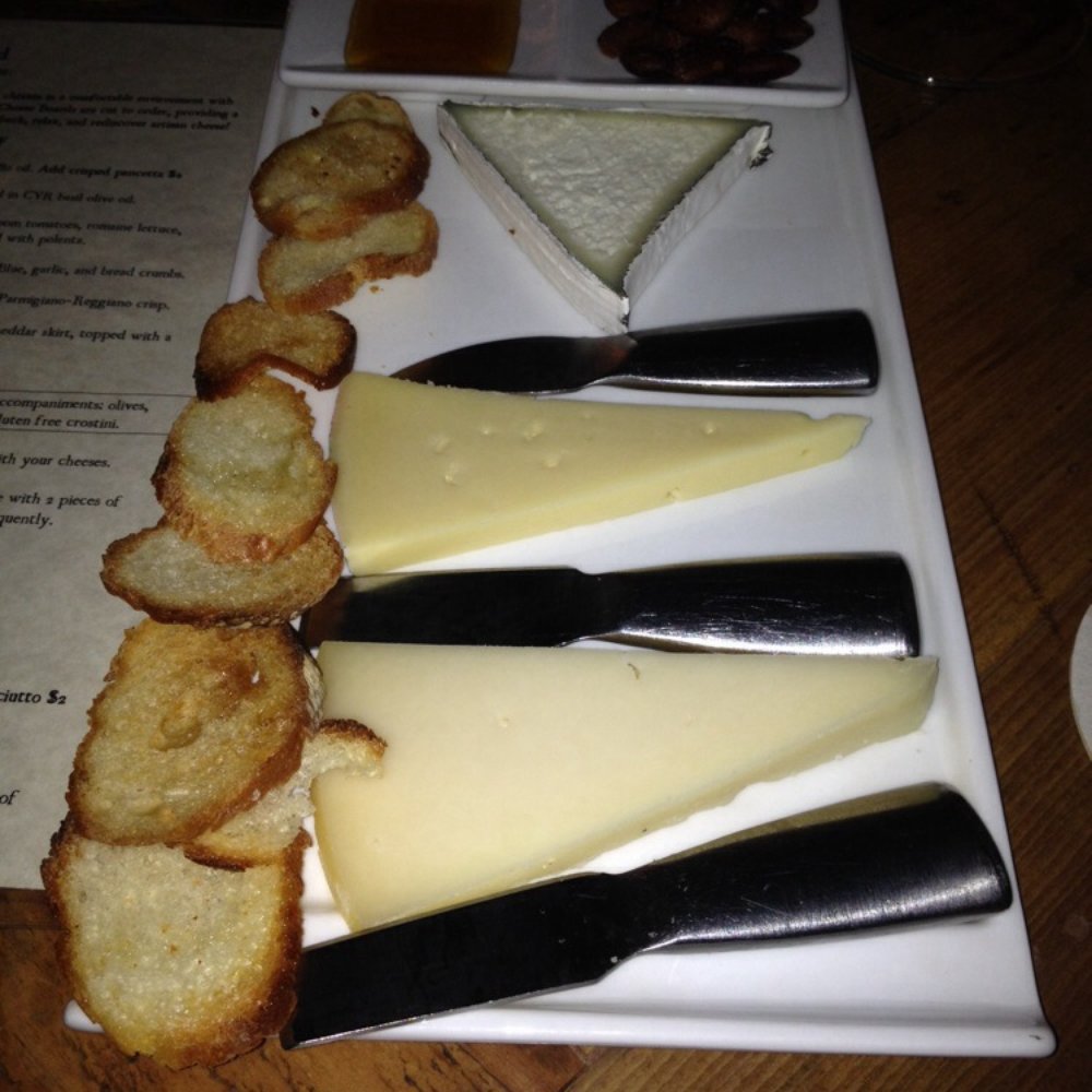 Cheese plate with almonds, honey and crostino Cheese plate with almonds, honey and crostino