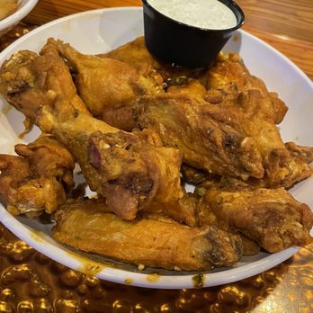 Miller's Ale House - 12 Hot Garlic wings for $8.99 on Wednesday. Asked for more sauce and it wasn't hot or garlicky. Still good though - Sports Bars Near Me - Orlando, Florida Miller's Ale House - 12 Hot Garlic wings for $8.99 on Wednesday. Asked for more sauce and it wasn't hot or garlicky. Still good though - Sports Bars Near Me - Orlando, Florida