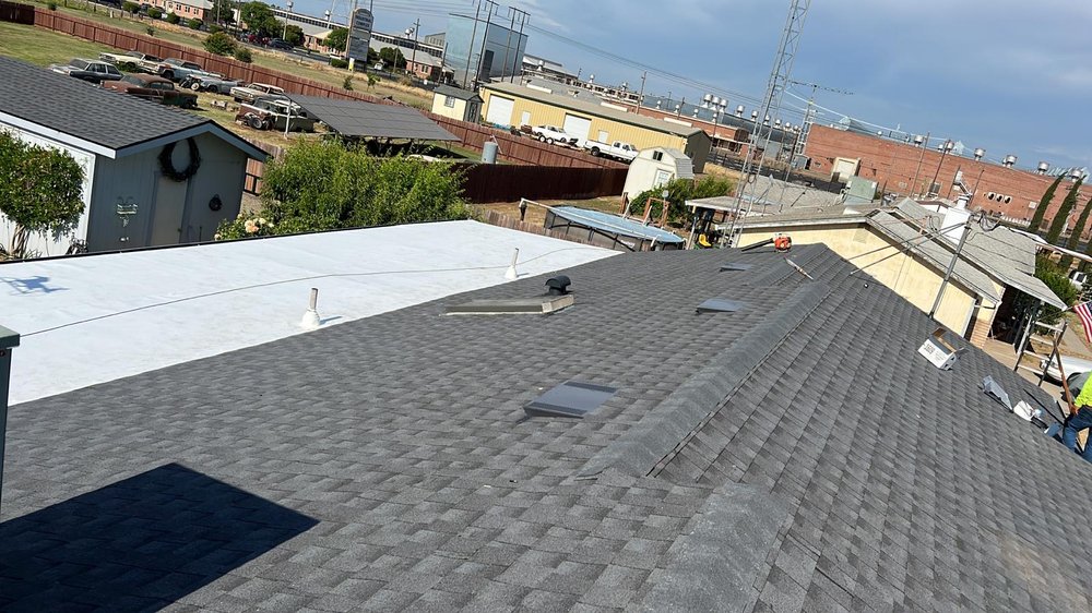 Slide of Art’s Roofing