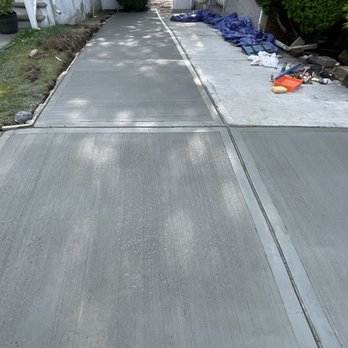 Greenwood Contractors Inc. - 4000 PSI ready-mix concrete poured for 3 Car driveway. - Roofing Near Me - The Bronx, New York Greenwood Contractors Inc. - 4000 PSI ready-mix concrete poured for 3 Car driveway. - Roofing Near Me - The Bronx, New York
