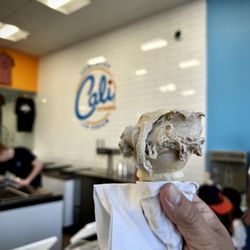 Cali Cream - Bourbon Butter Pecan single scoop in a cone