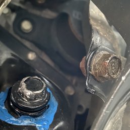 Drain plug on left showing damage. Drain plug on left showing damage.