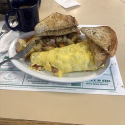 The Eggshell Restaurant - Meat lovers with home fries