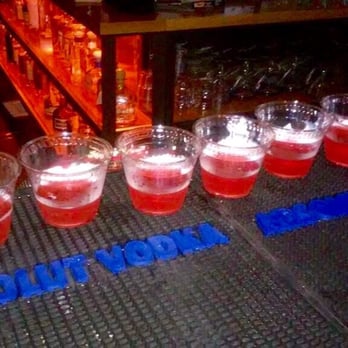 Daves On Northern - a row of shot glasses on a bar - Sports Bars Near Me - Phoenix, Arizona
